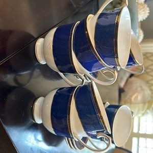 Wedgwood crown sapphire china tea cups and saucers. Total of 9 sets.$450 value